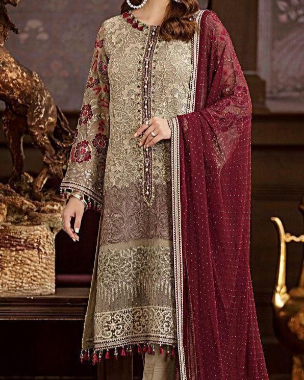 Premium chiffon embroidered 3-piece suit with heavy neckline, tassel borders, embroidered sleeves, chiffon dupatta with 4-side embroidery, and malai trouser – perfect for weddings and festive wear.