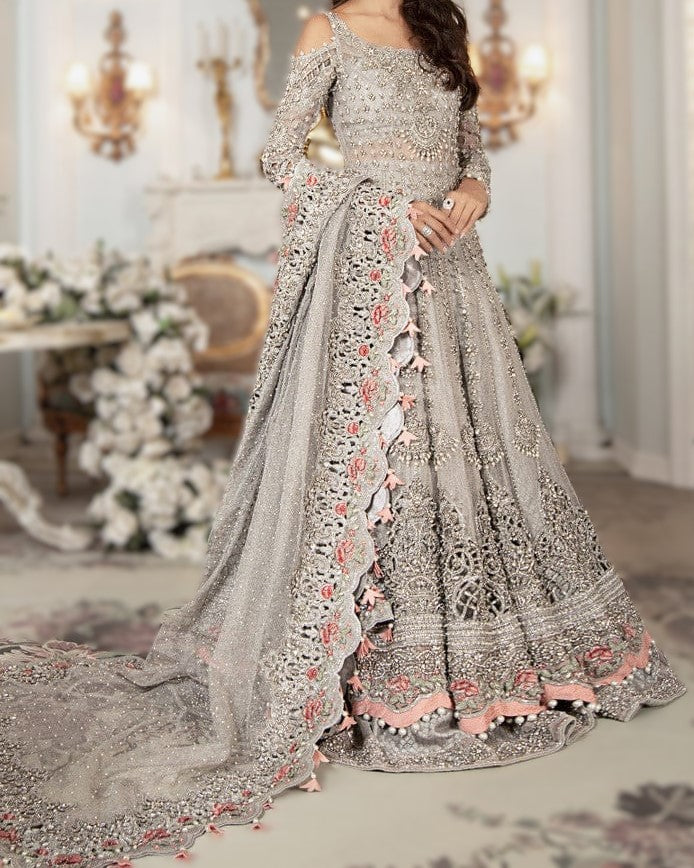 Bridal dress in Chinese net with hand embroidery and kaliyan style front & back