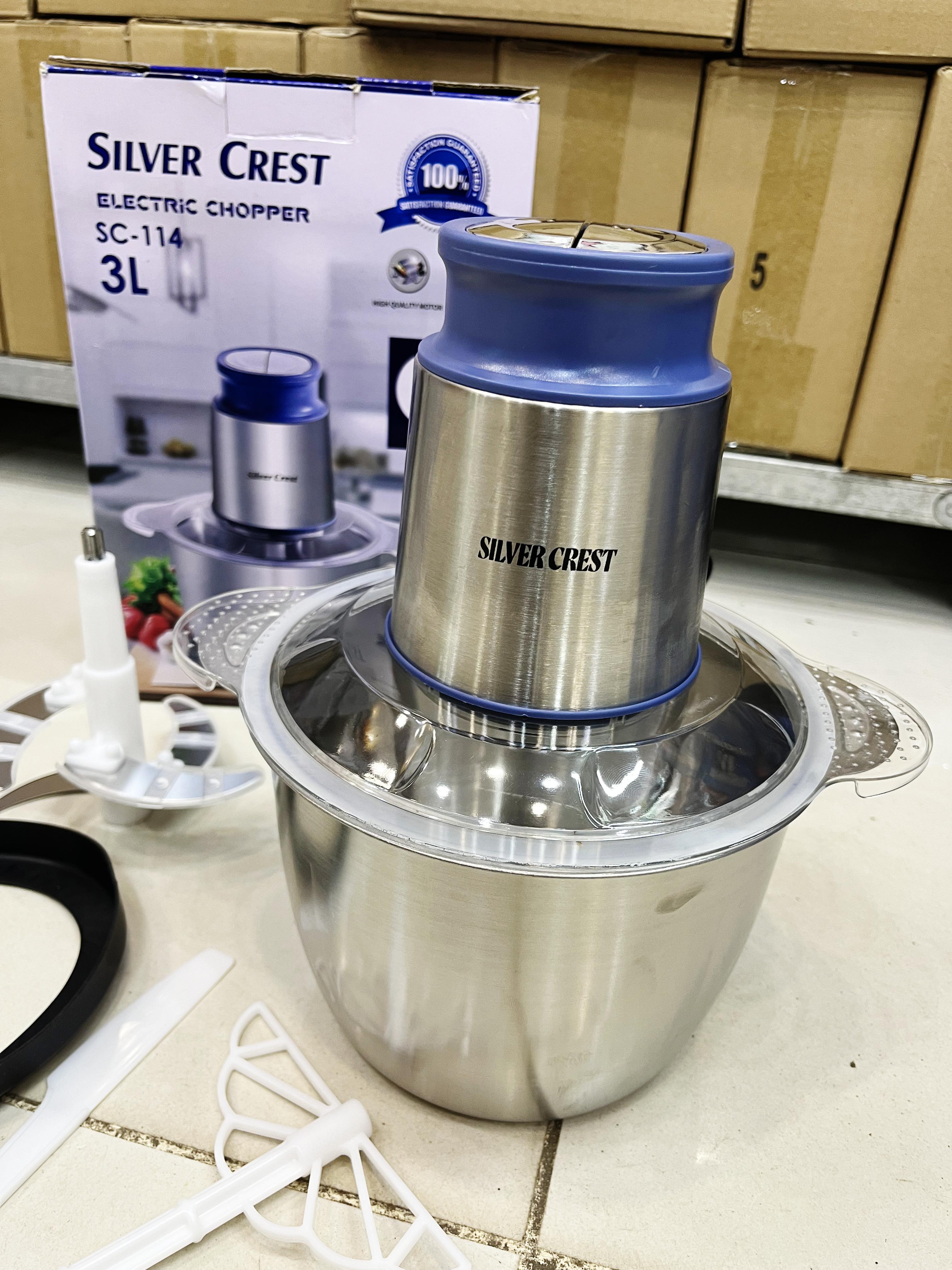 Silver Crest electric chopper with packaging in the background