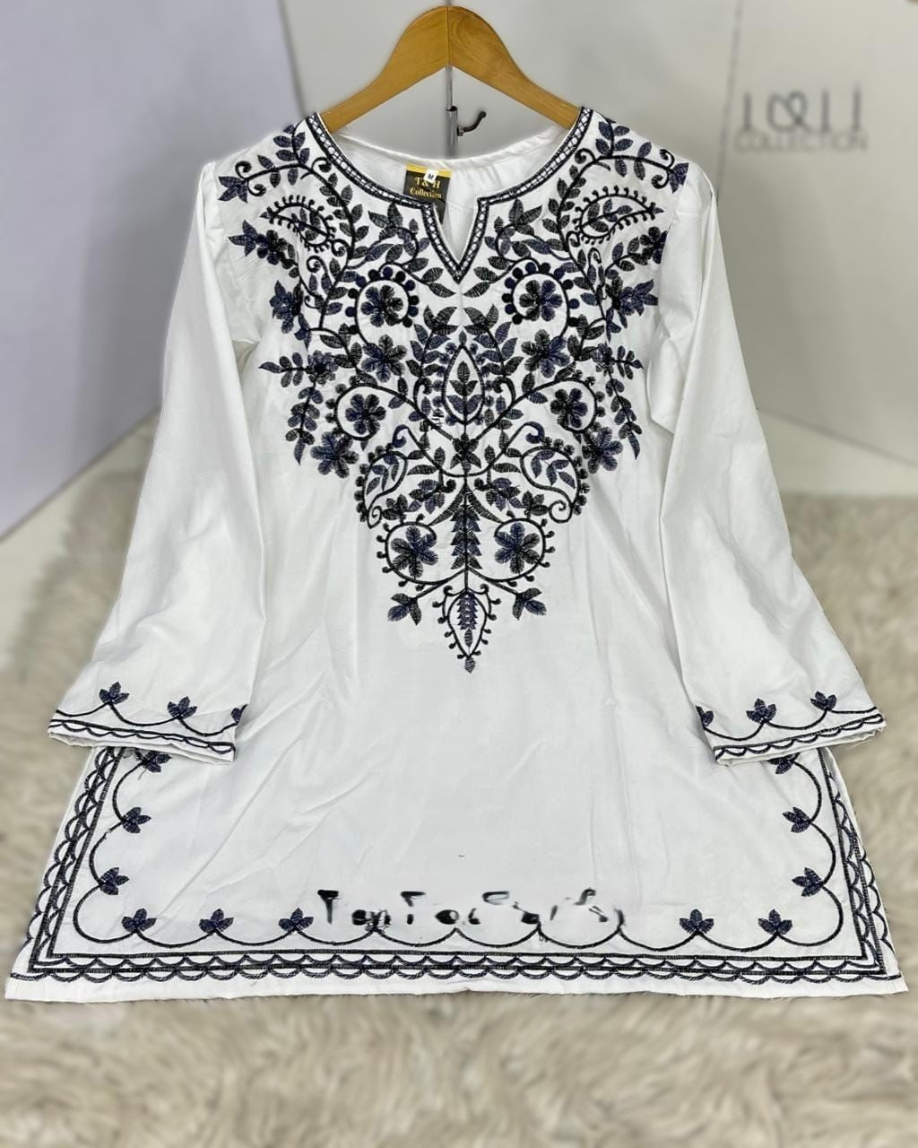 "Women’s Cotton Kurti with Elegant Embroidery Design"