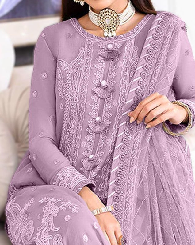 Purple embroidered traditional outfit with a white background