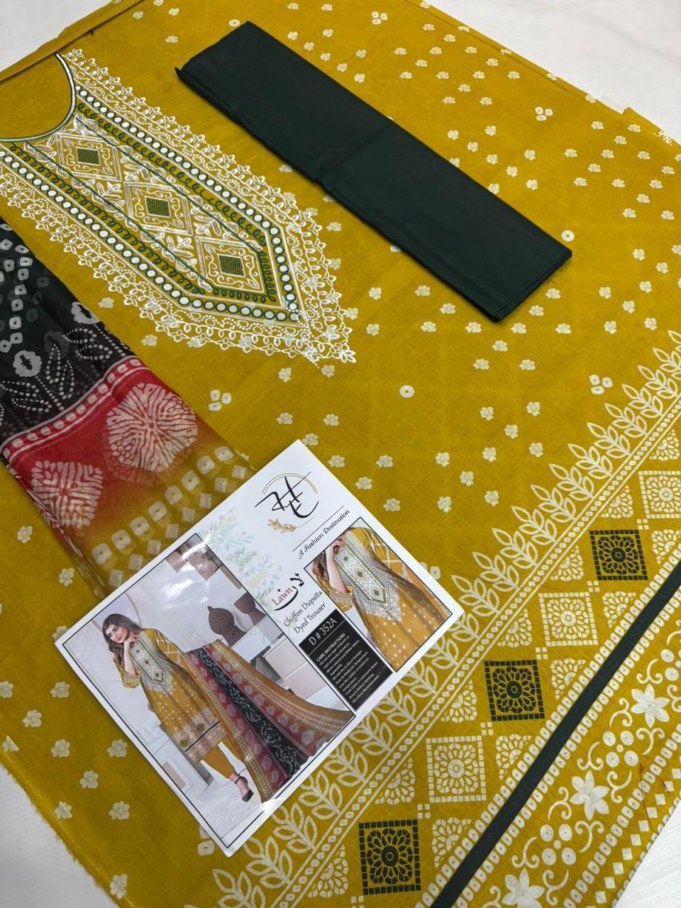 Women’s lawn embroidered dress with dyed trouser
Affordable summer embroidered suits online