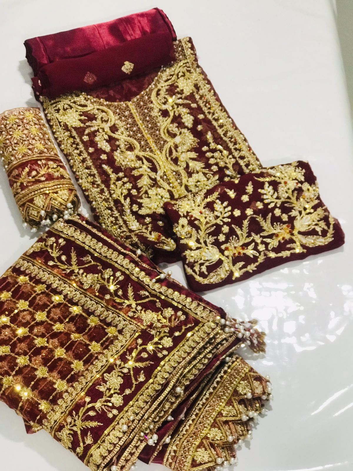 Silk trousers paired with embroidered shirt for festive wear
Complete 3-piece mehroon suit for parties and weddings