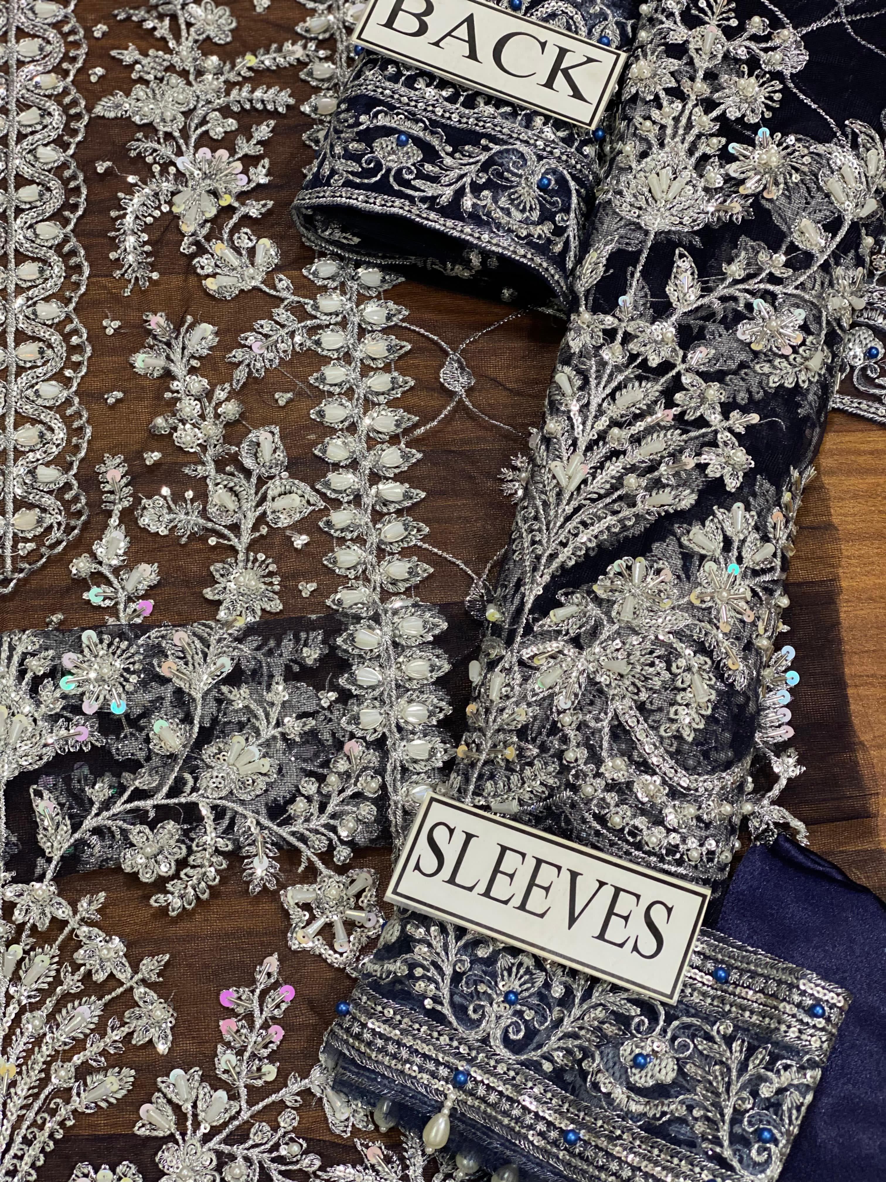 Elegant Net Suit with Embroidered Dupatta – Luxury Bridal Collection