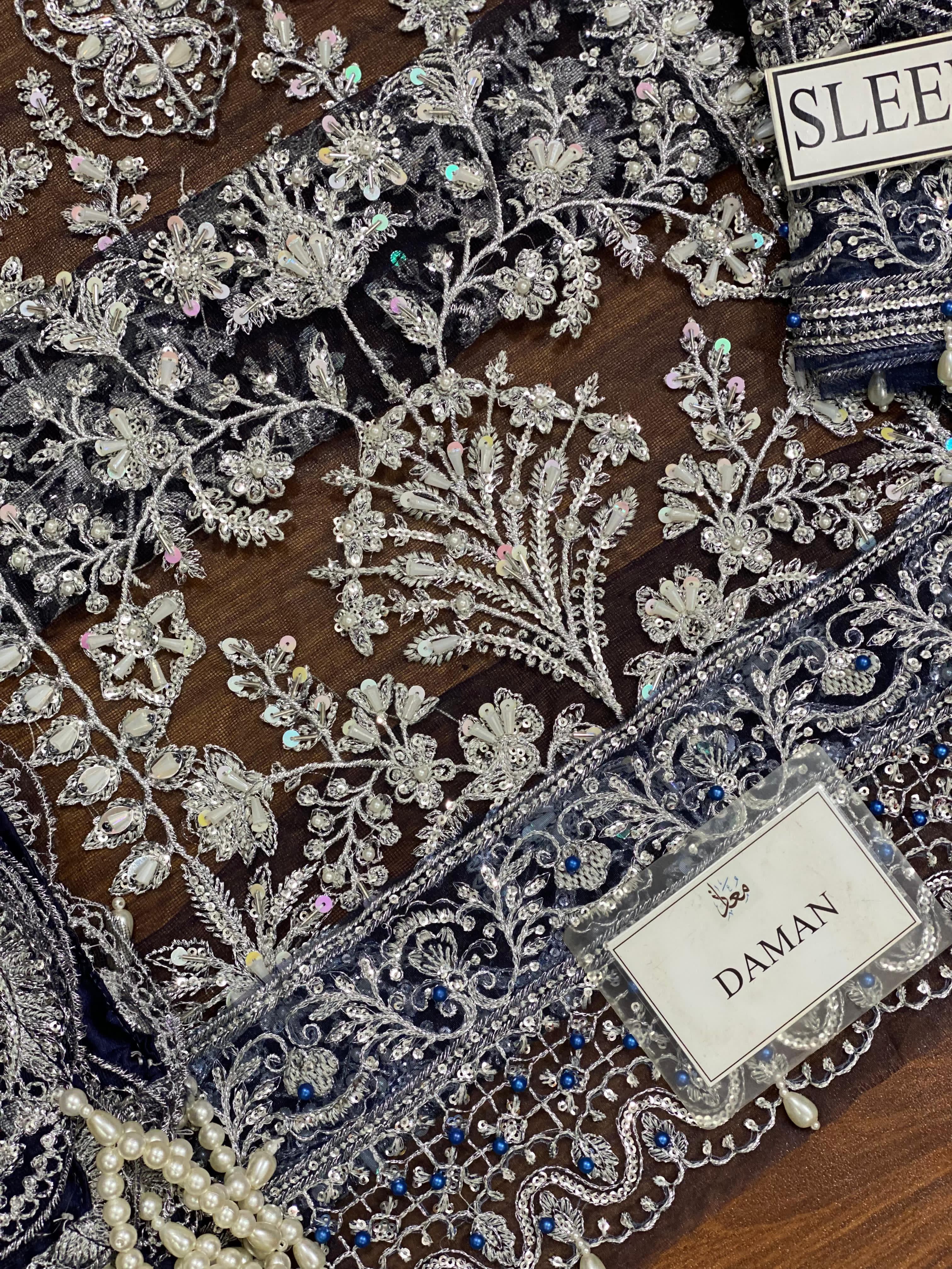 Elegant Net Suit with Embroidered Dupatta – Luxury Bridal Collection