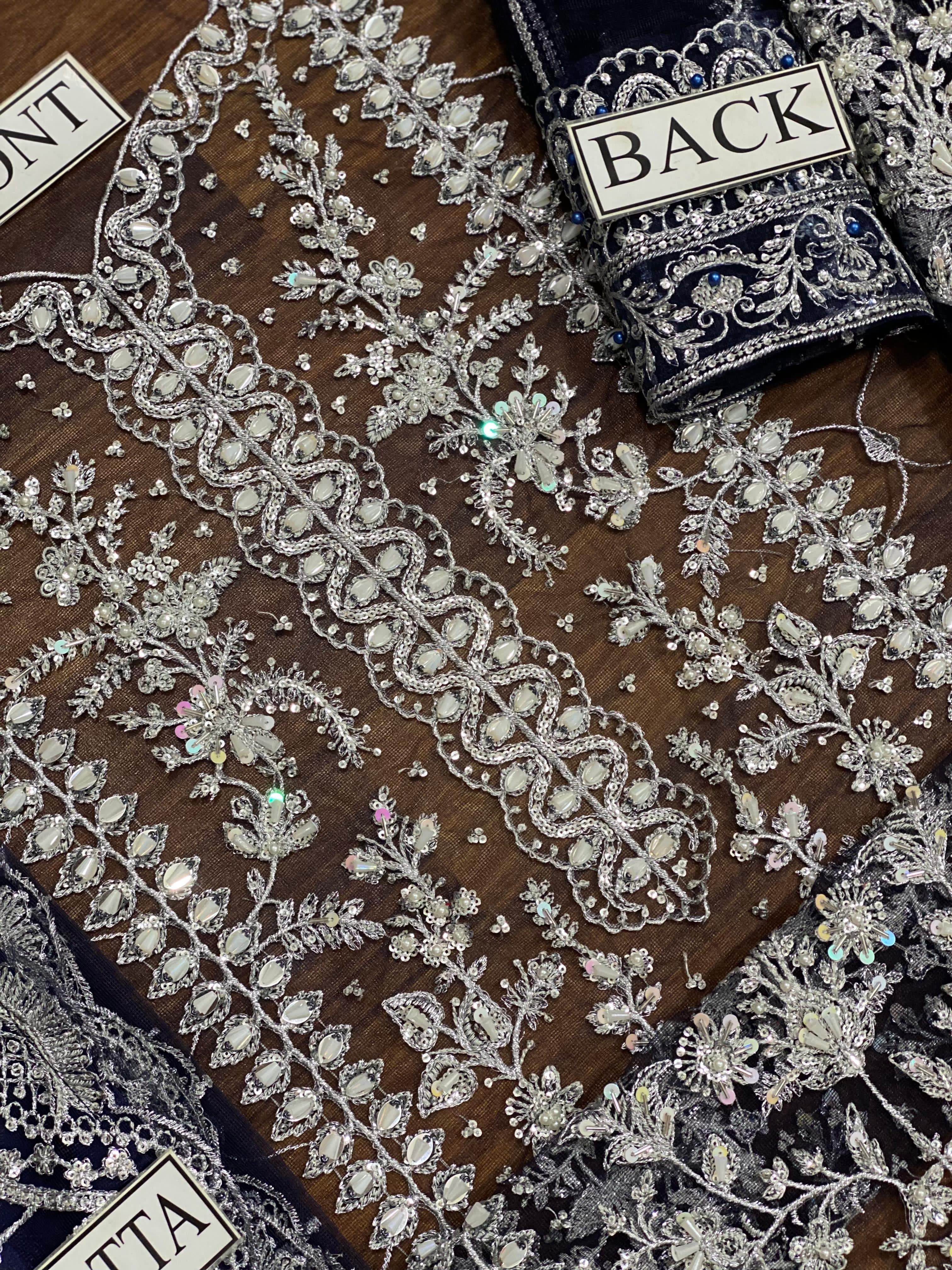 Elegant Net Suit with Embroidered Dupatta – Luxury Bridal Collection