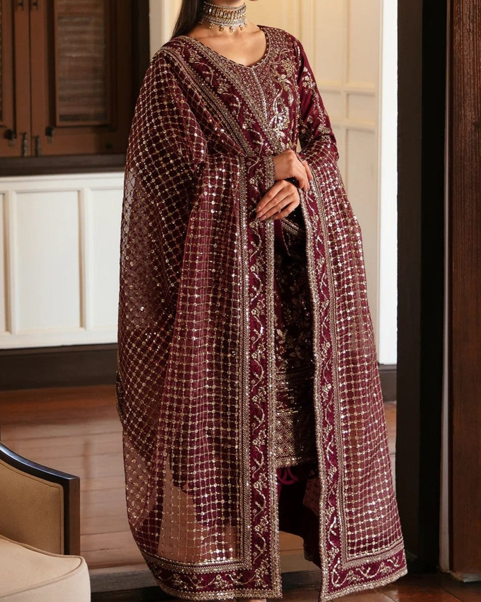 Silk trousers paired with embroidered shirt for festive wear
Complete 3-piece mehroon suit for parties and weddings