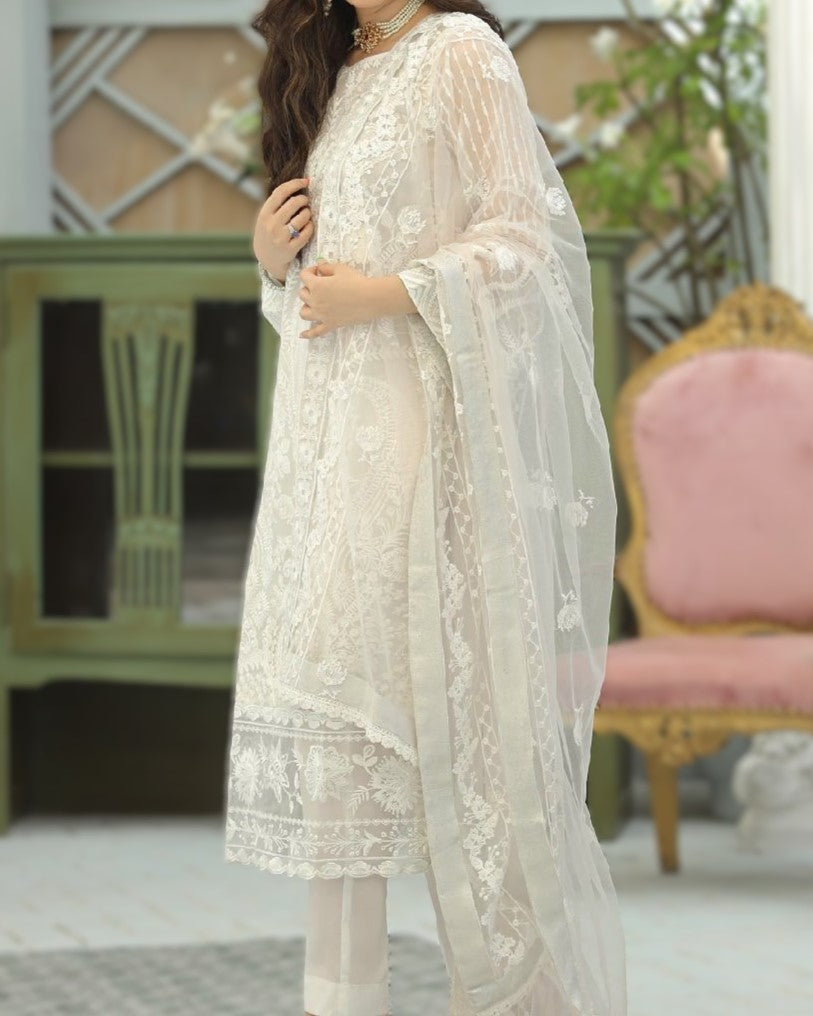 Heavy embroidered organza shirt with sequence work and embroidered daman