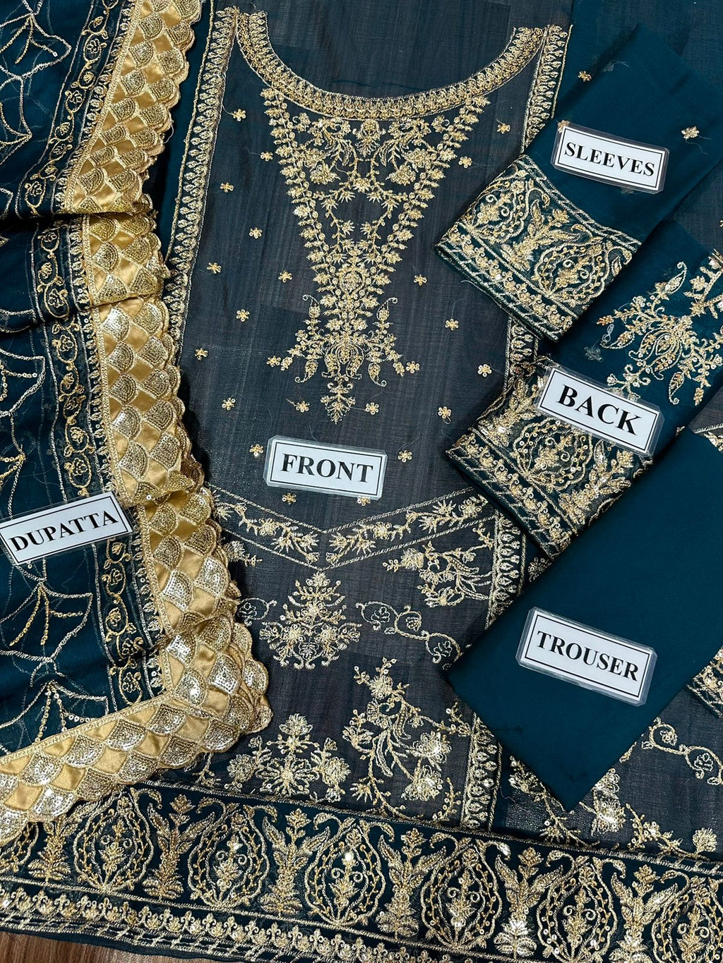 Chiffon shirt front and back with embroidery and daman bunch design
Premium embroidered chiffon 3-piece suit with sequence work