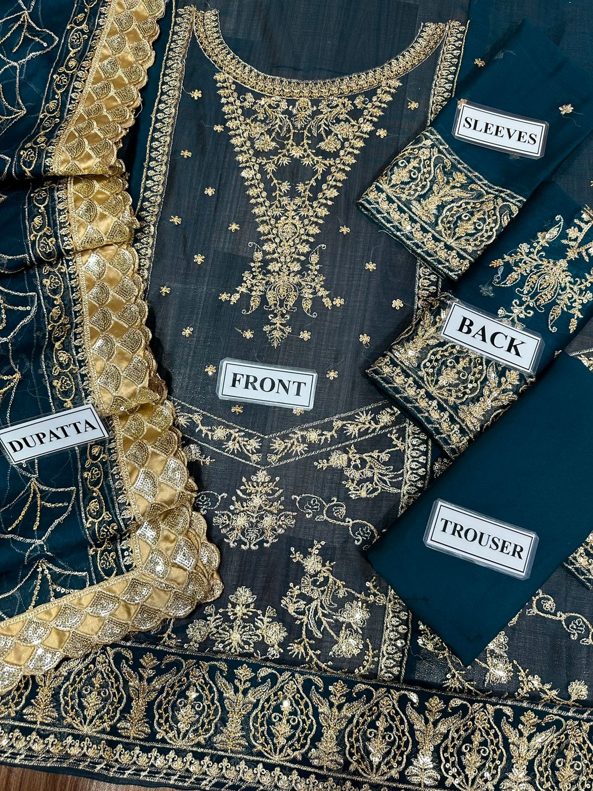 Chiffon shirt front and back with embroidery and daman bunch design
Premium embroidered chiffon 3-piece suit with sequence work
