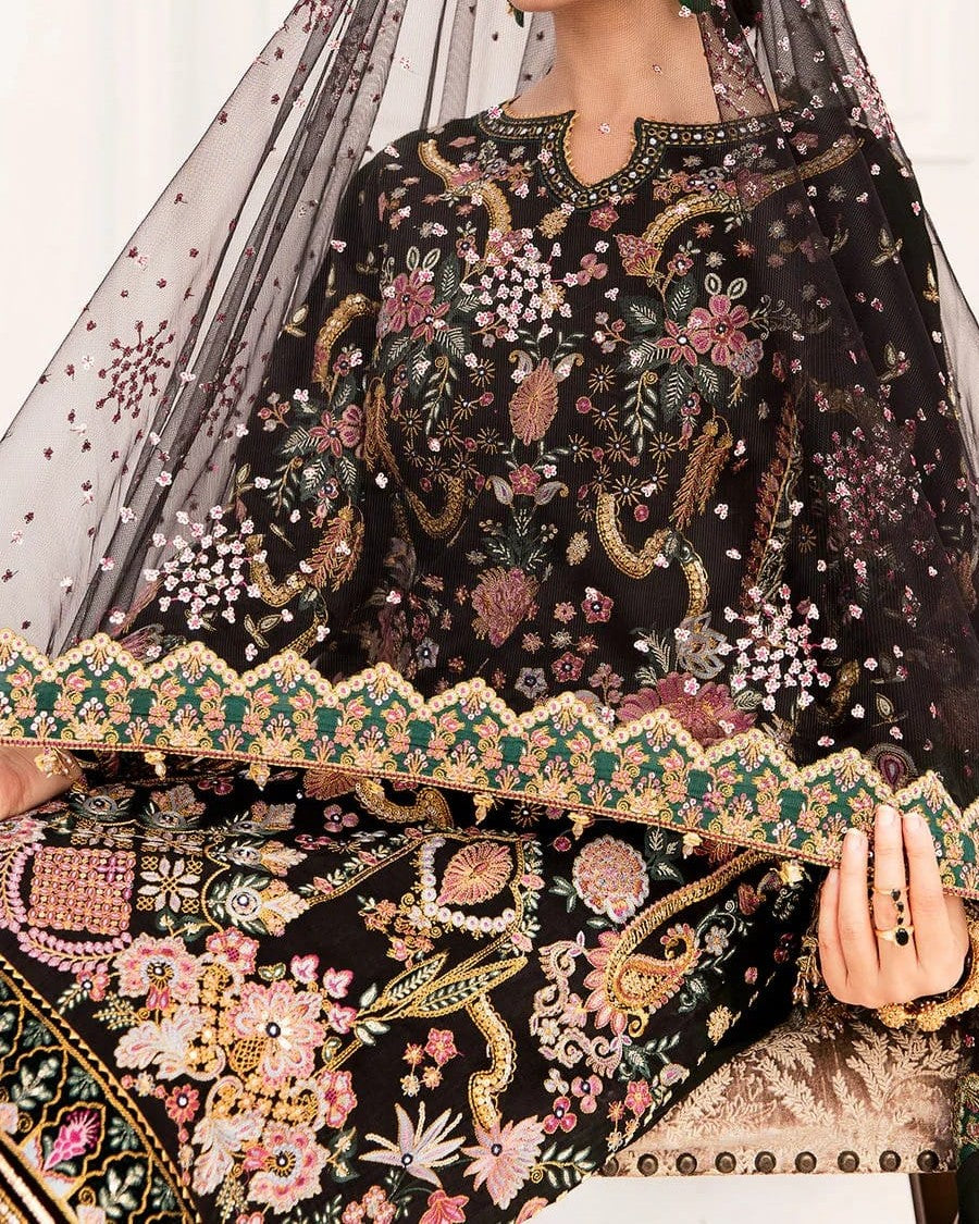 Black heavy embroidered bridal dress with net shirt, embroidered dupatta with handmade tassels, and crape trouser – perfect for weddings and formal wear.