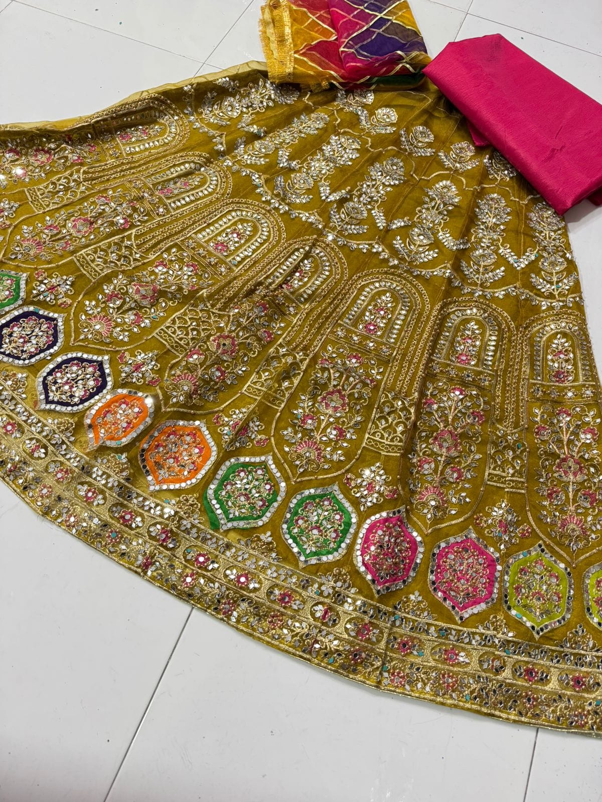 Organza tissue lehenga with mirror pearl embroidery, net gota dupatta and plain katan shirt 3-piece set for women in Pakistan