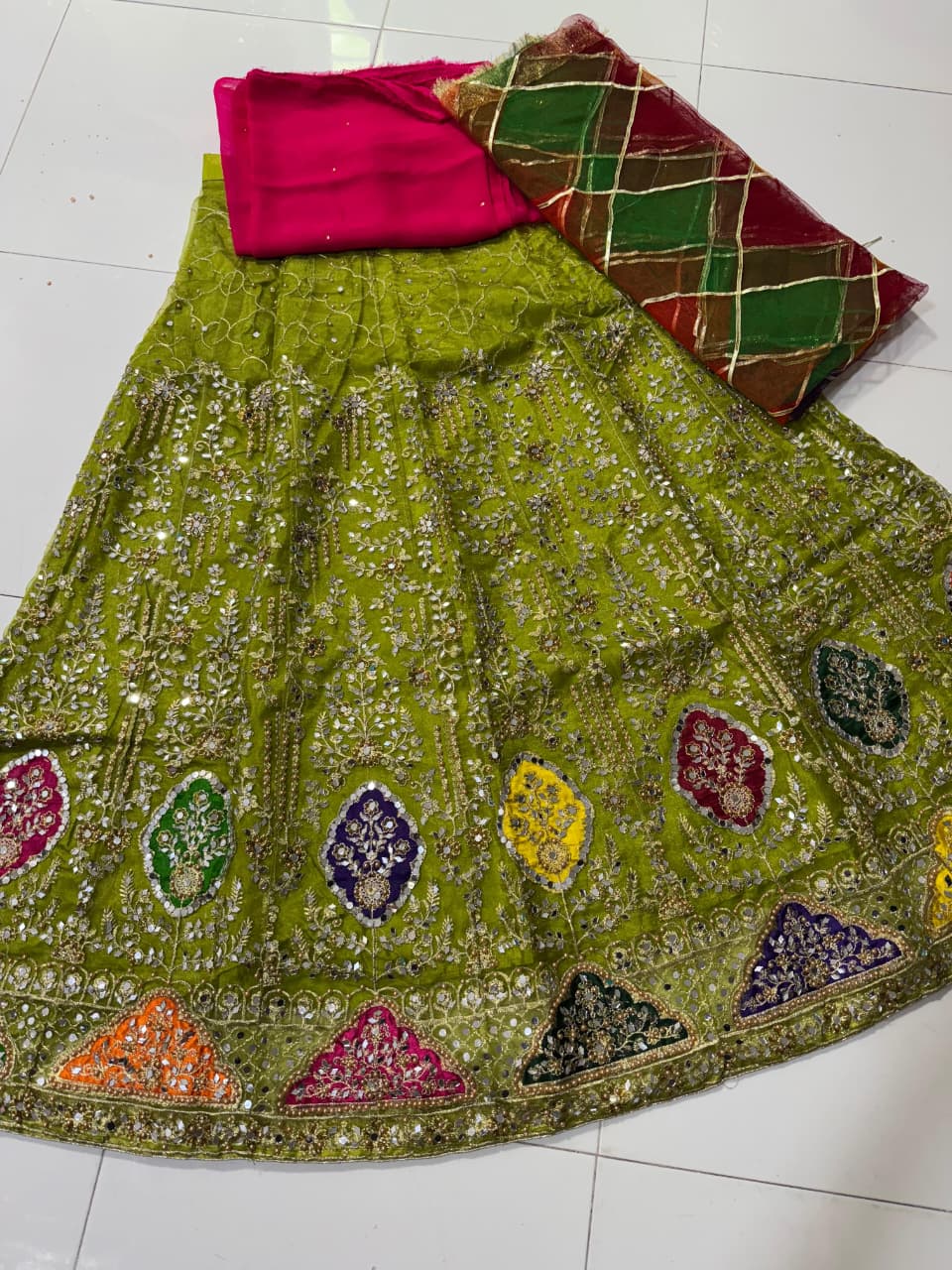 Organza tissue lehenga with mirror pearl embroidery, net gota dupatta and plain katan shirt 3-piece set for women in Pakistan