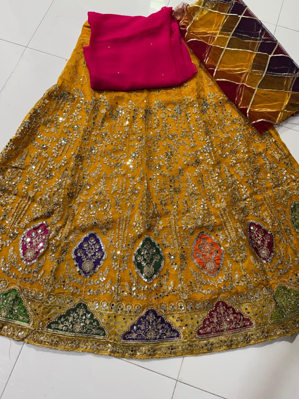 Organza tissue lehenga with mirror pearl embroidery, net gota dupatta and plain katan shirt 3-piece set for women in Pakistan
