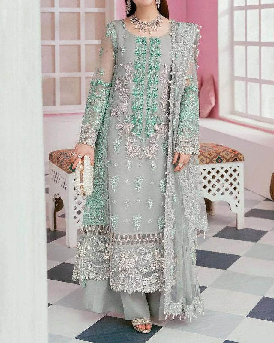 Bridal organza embroidered dress with handwork, pearl sleeves, tassel dupatta and malai trouser for women in Pakistan