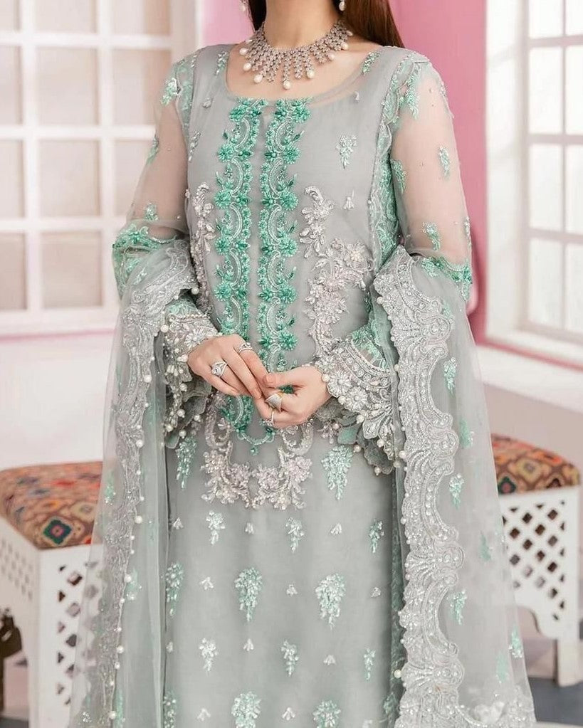 Bridal organza embroidered dress with handwork, pearl sleeves, tassel dupatta and malai trouser for women in Pakistan