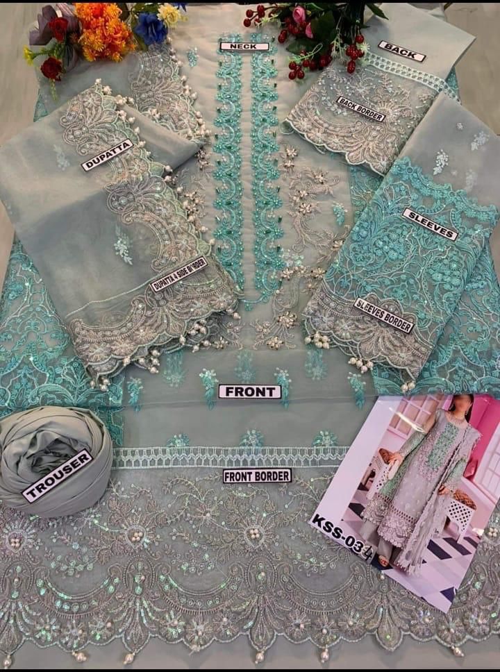 Bridal organza embroidered dress with handwork, pearl sleeves, tassel dupatta and malai trouser for women in Pakistan