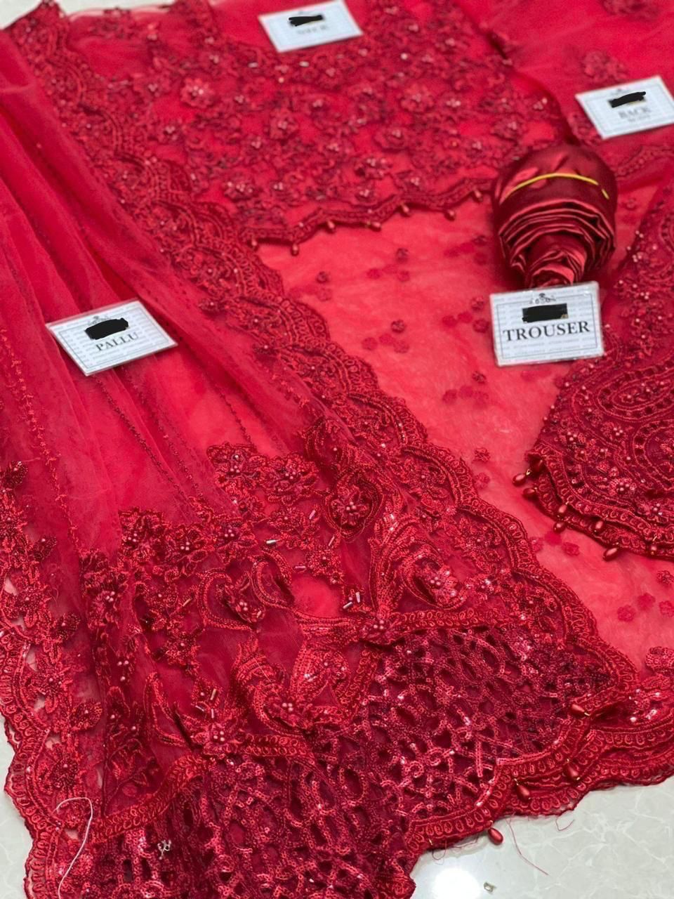 Exclusive luxury saree 2024 – embroidered net saree with adda work, cut work borders, tassel sleeves, silk petticoat and heavy jhall pallu