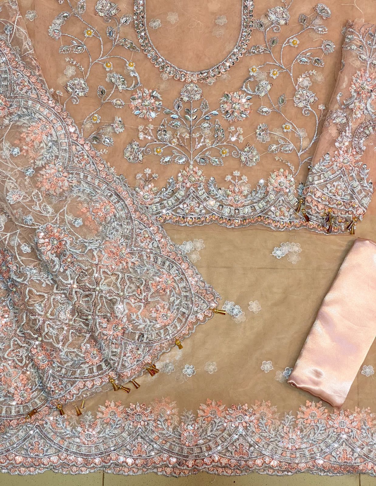 Exclusive luxury saree 2024 – embroidered net saree with adda work, cut work borders, tassel sleeves, silk petticoat and heavy jhall pallu
