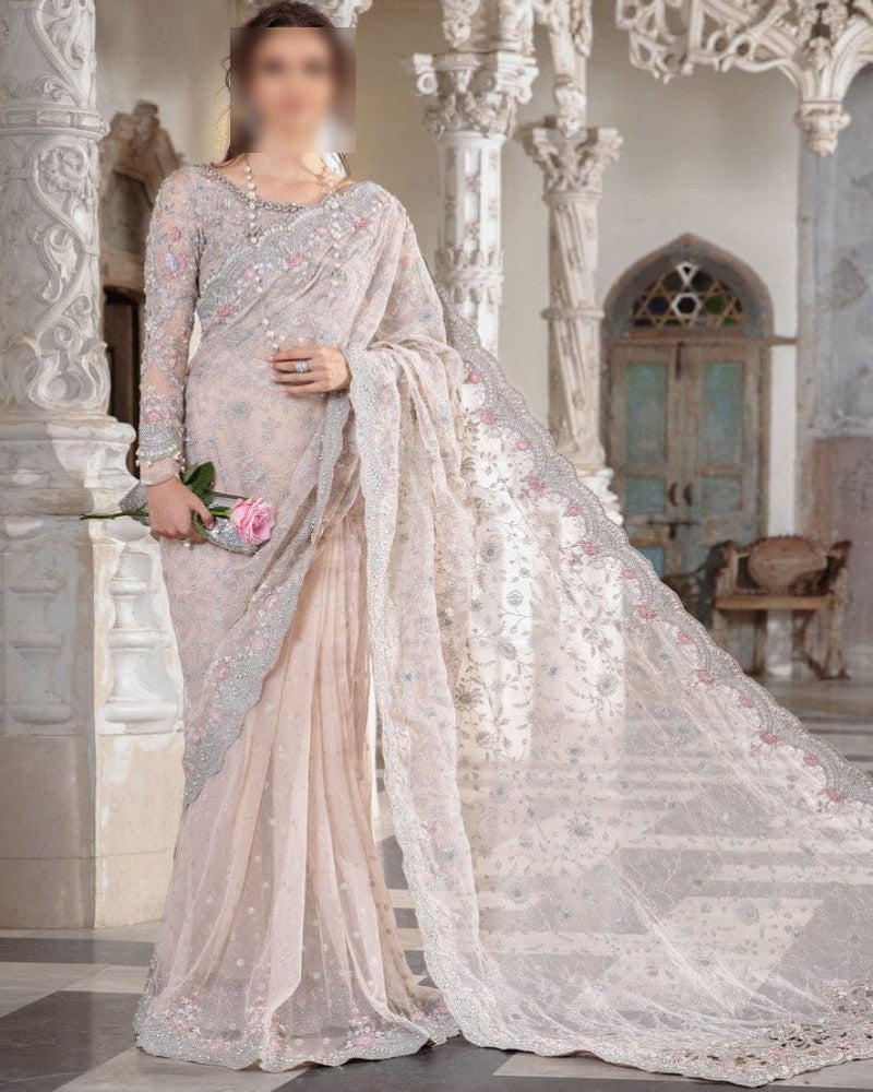 Exclusive luxury saree 2024 – embroidered net saree with adda work, cut work borders, tassel sleeves, silk petticoat and heavy jhall pallu