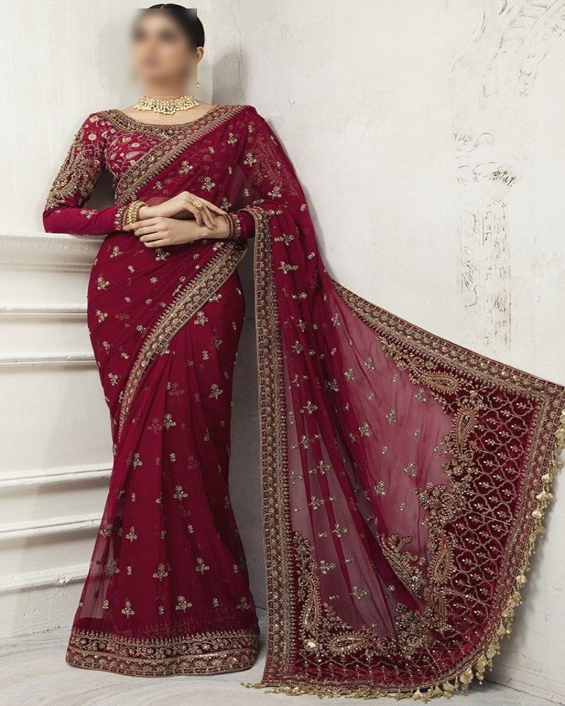 Luxury wedding saree – net saree with heavy embroidery, sequence work, stone hand embellishment, embroidered silk pallu with tassels – buyfromdanish.com