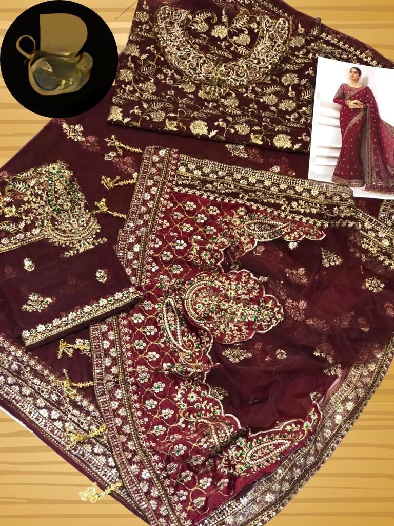 Luxury wedding saree – net saree with heavy embroidery, sequence work, stone hand embellishment, embroidered silk pallu with tassels – buyfromdanish.com