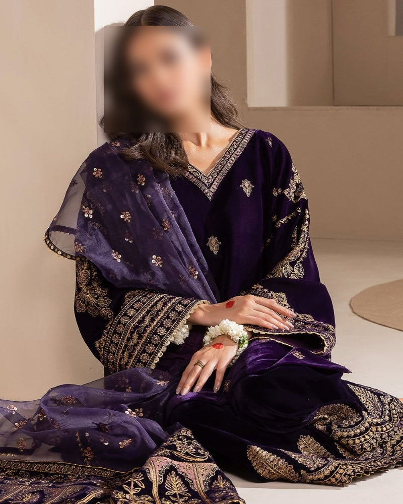 Premium unstitched purple velvet suit with heavy embroidered neckline, full embroidered front, organza dupatta with 4-side lace, and satin silk embroidered trouser – buyfromdanish.com