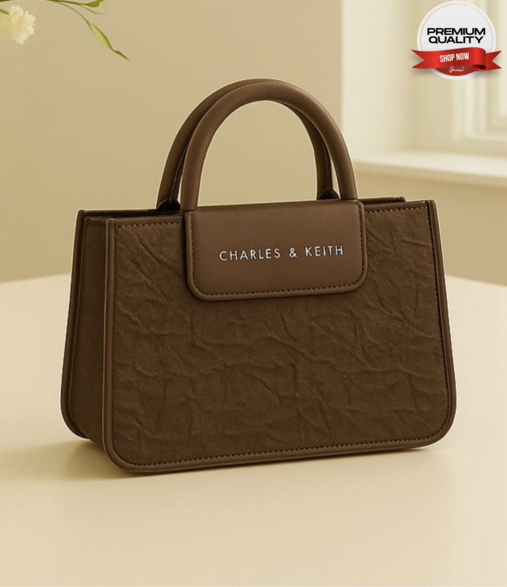 Luxury women’s shoulder bag with long strap, metal zip, and elegant compact design – buyfromdanish.com
