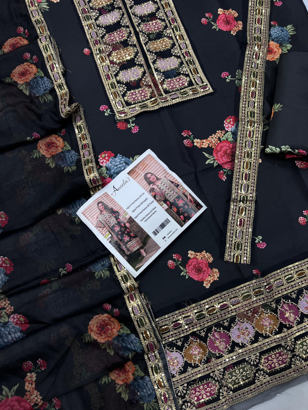 Pure silk 3-piece unstitched suit with heavy embroidery and 4-side lace dupatta – luxury women’s wear Pakistan 2025